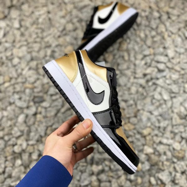 Nike Air Jordan 1 low Superficie laccata Nero Oro Bianco