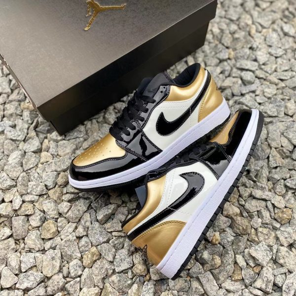 Nike Air Jordan 1 low Superficie laccata Nero Oro Bianco